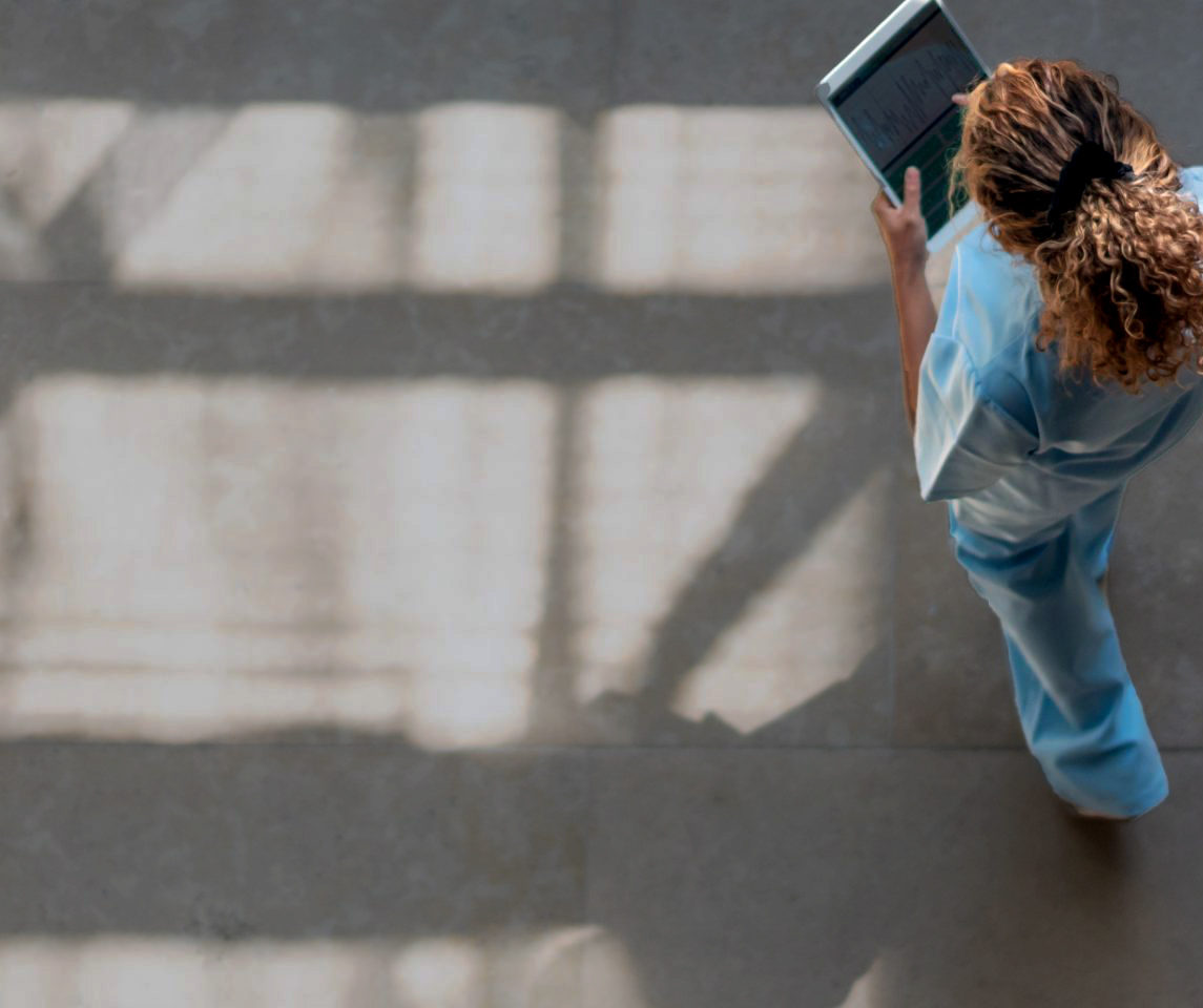 nurse-walking-with-tablet